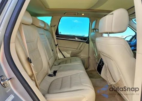 2013 Volkswagen Touareg Hybrid z USA, uszkodzony, nr VIN WVGEG9BP0DD013907